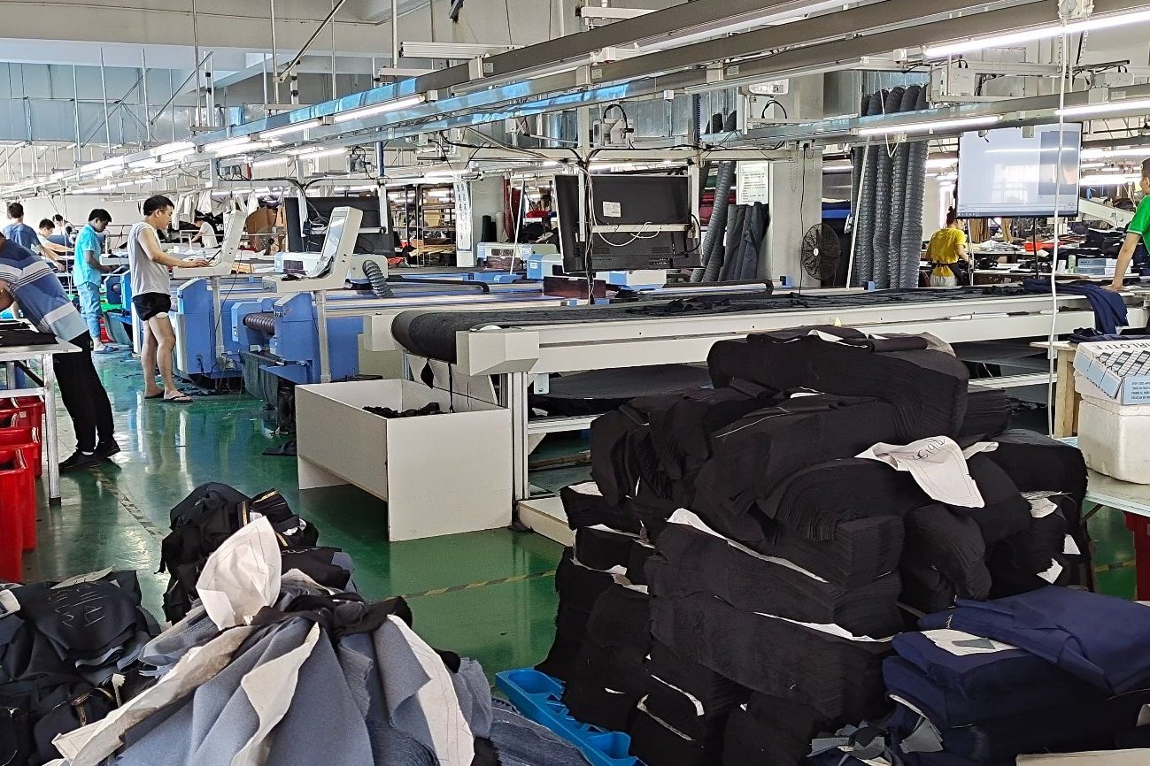 HUMTUN in-house factory workshop, bulk production of custom workwear